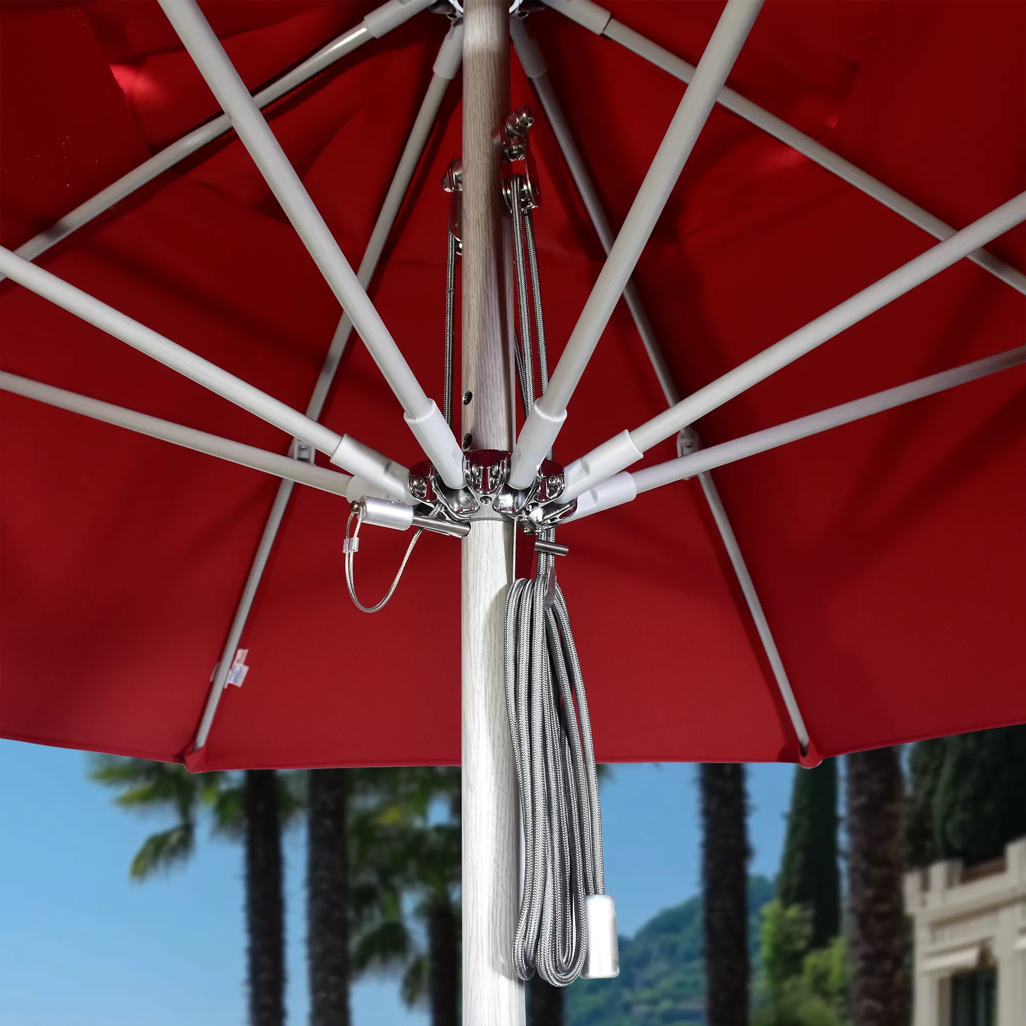 Close-up of the pulley lift system on the Rodeo Series commercial patio umbrella by California Umbrella, designed for smooth and effortless canopy adjustment.