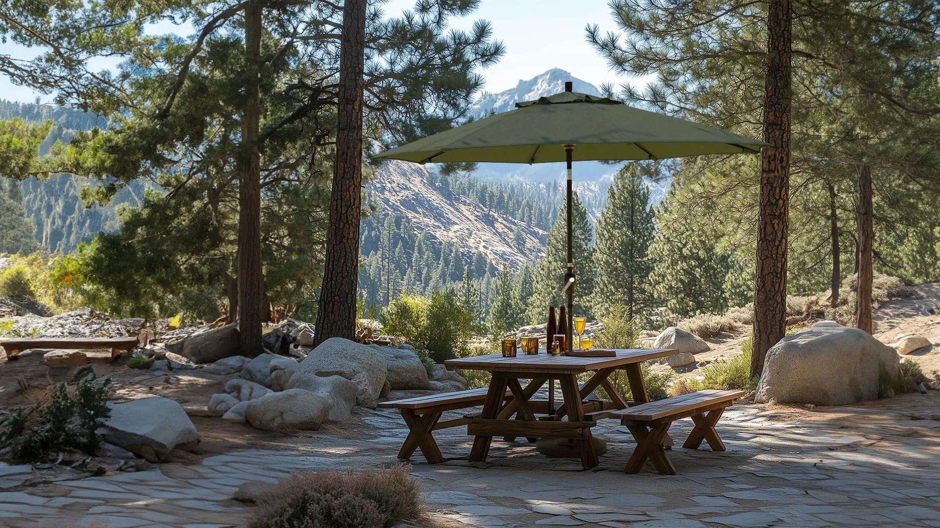 Hero banner image showcasing the Pacific Trail Series Patio Umbrella by California Umbrella, set in a majestic outdoor setting reminiscent of the Pacific Crest Trail. This market-style umbrella, known for its classic elegance and reliable functionality, stands over a rustic picnic table in a tranquil, tree-lined mountain area. Crafted with durable aluminum and featuring a smooth crank lift and push-button tilt, the umbrella provides adaptable shade and enduring performance, making it a perfect addition to any outdoor living space seeking both style and practicality.