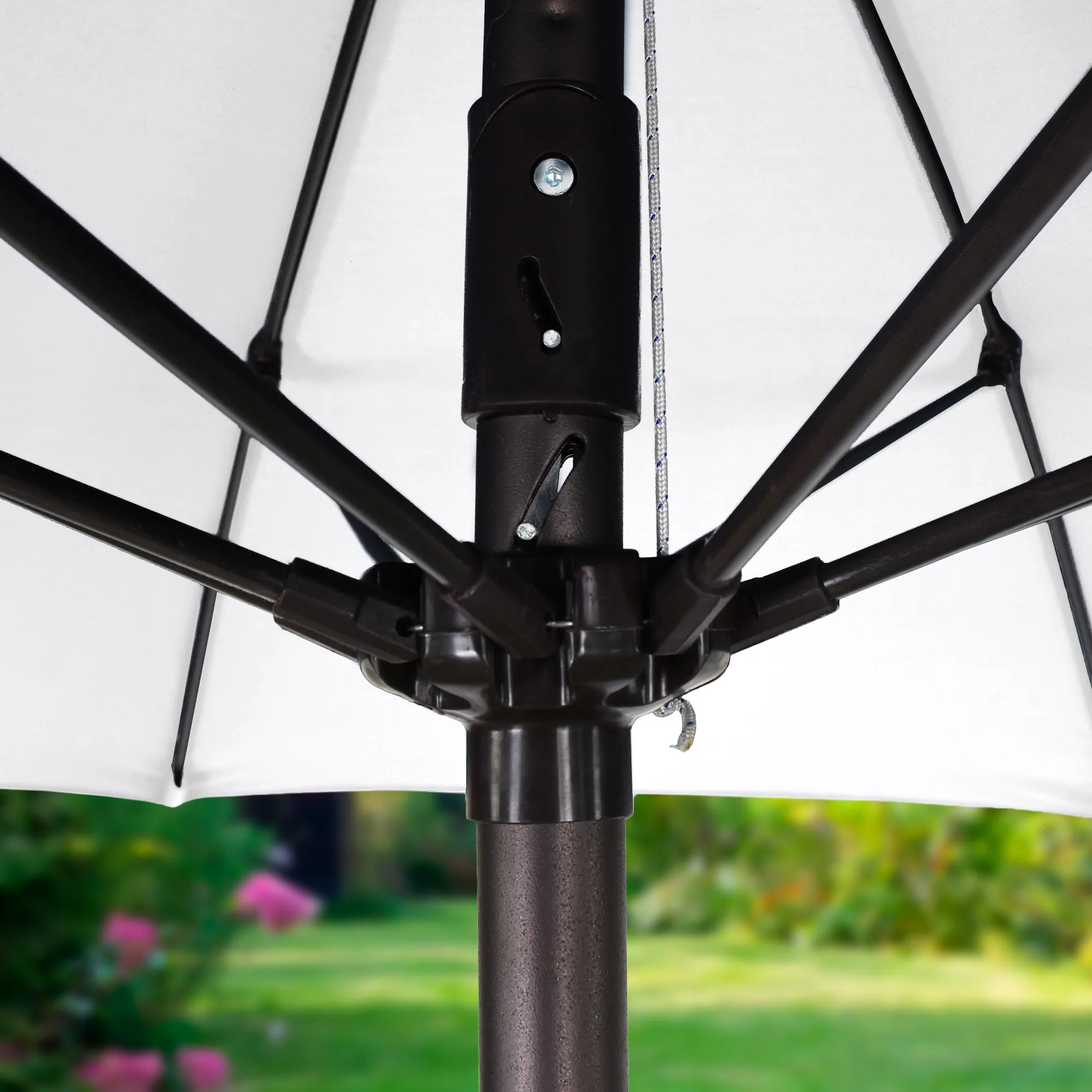 Close-up image of the durable aluminum center pole of the Vento Series Patio Umbrella by California Umbrella. This feature highlights the robust and rust-resistant construction that supports the umbrella, ensuring stability and long-term outdoor use.